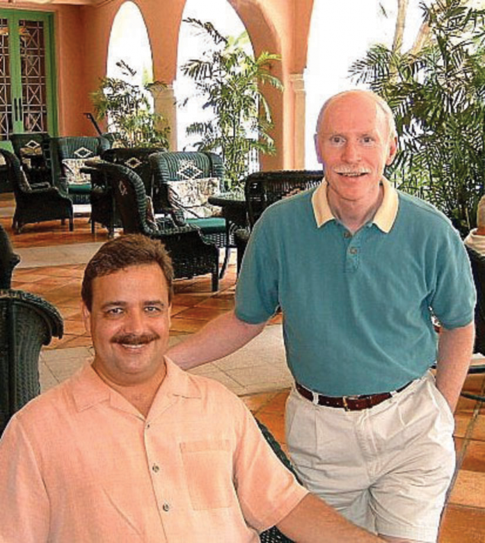 Liberty Circle member Dan Guio, standing next to his partner Wayne Reeves.