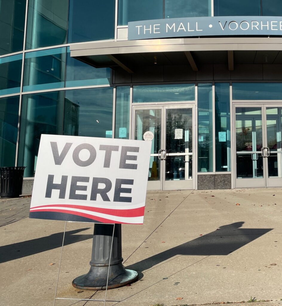 "Vote Here" sign propped up in front of municipal building