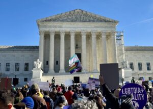 Rally outside the Supreme Court during oral arguments in U.S. v. Skrmetti