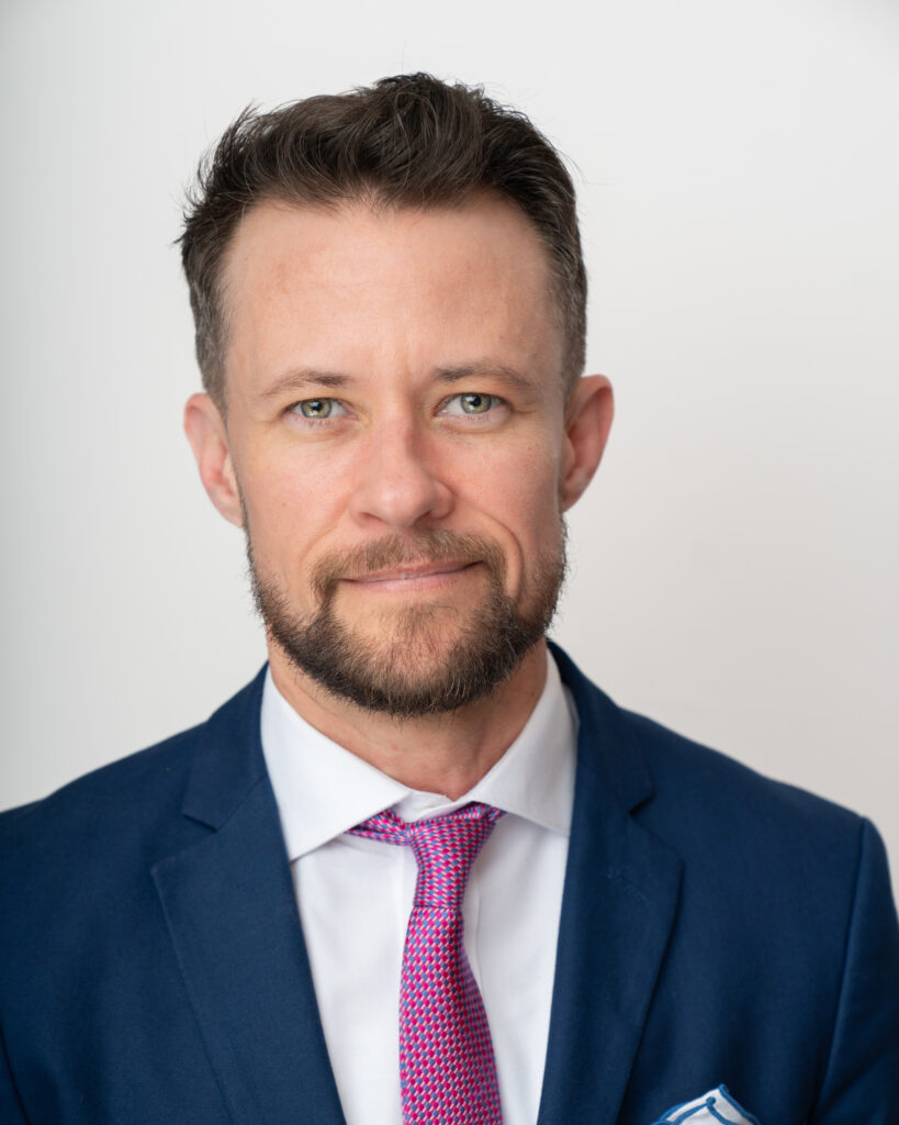 Headshot of Carl Charles, Elayne Cassidy Nicholas Memorial Counsel for Trans and Nonbinary Rights at Lambda Legal
